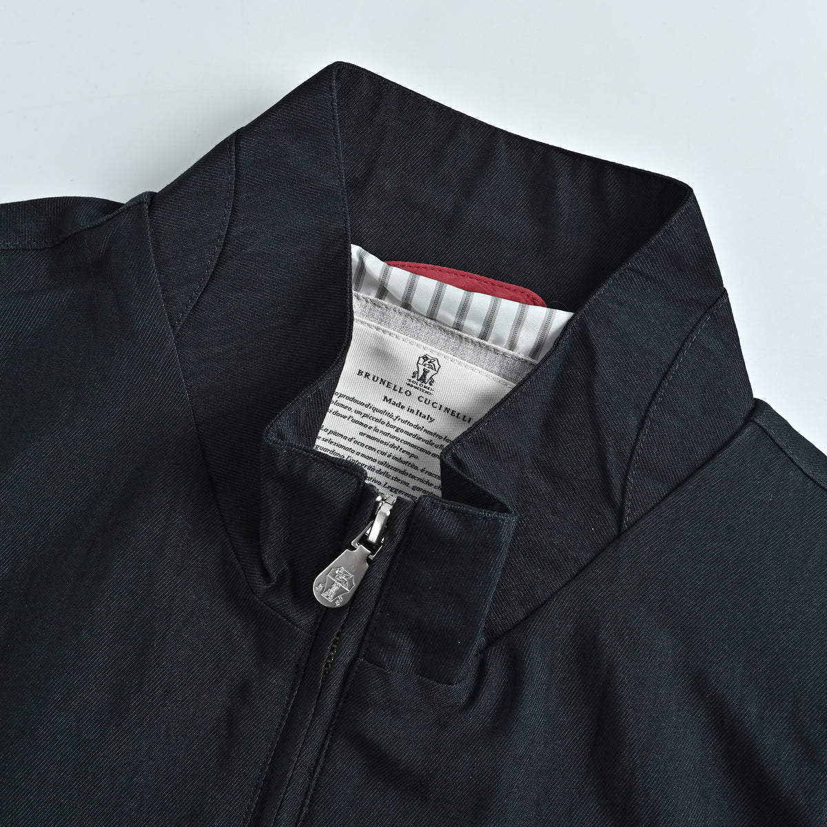 Brunello Cucinelli Travelwear Badge-Embroidered Zip Stand-Collar Jacket – NavyMM49A7433G-CKM3