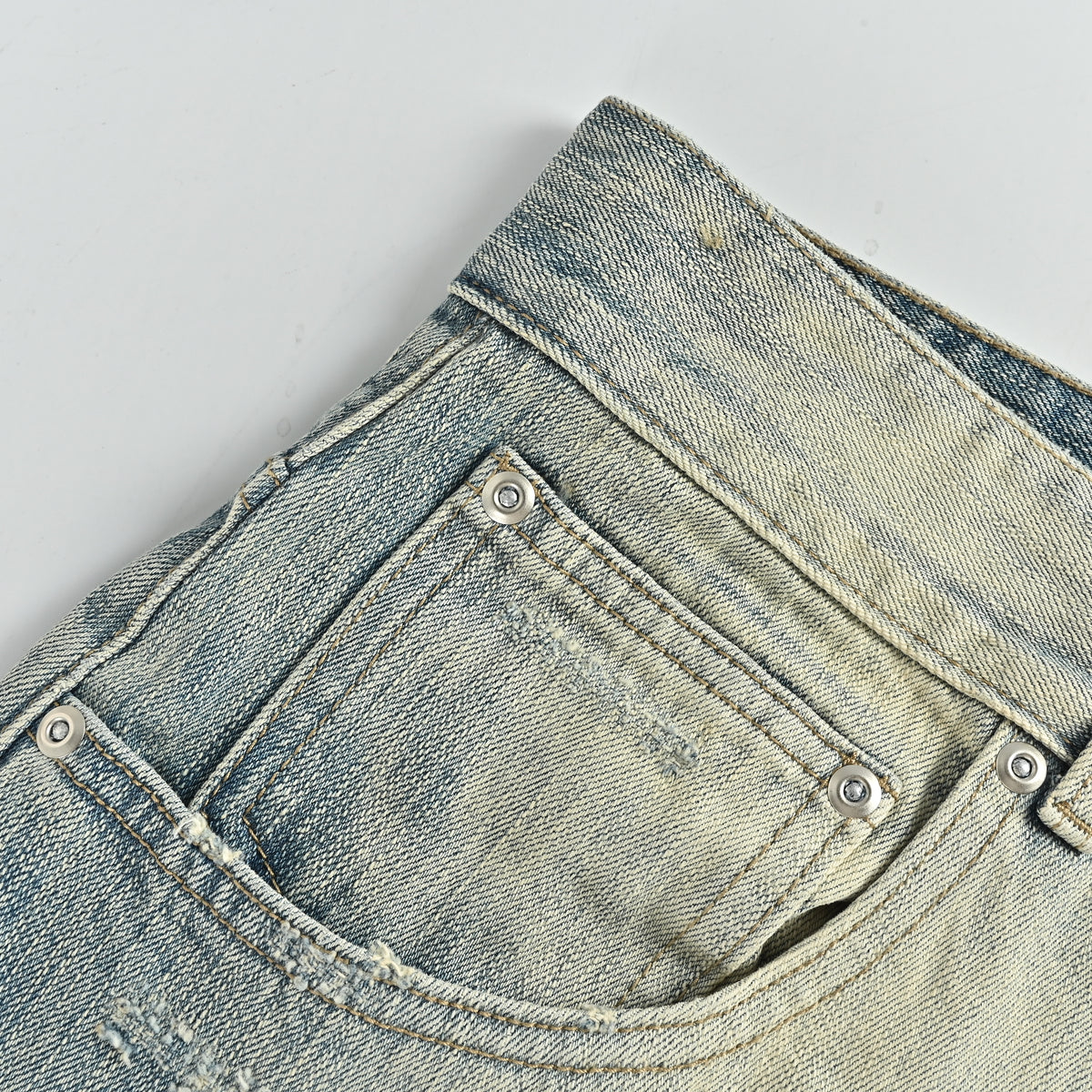 Ancellm SS25 Destroy-and-Patch Tapered Denim – Rust-Wash Blue SG6400911
