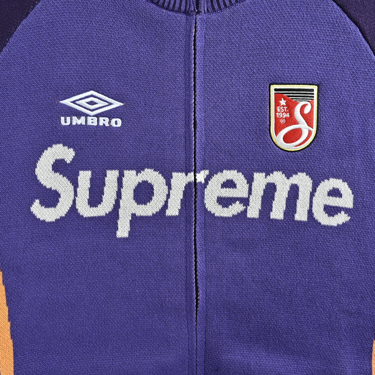 Supreme x Umbro SS25 Club-Inspired Zip Stand-Collar Knit Jacket – Purple/NavySUP-SS25-236