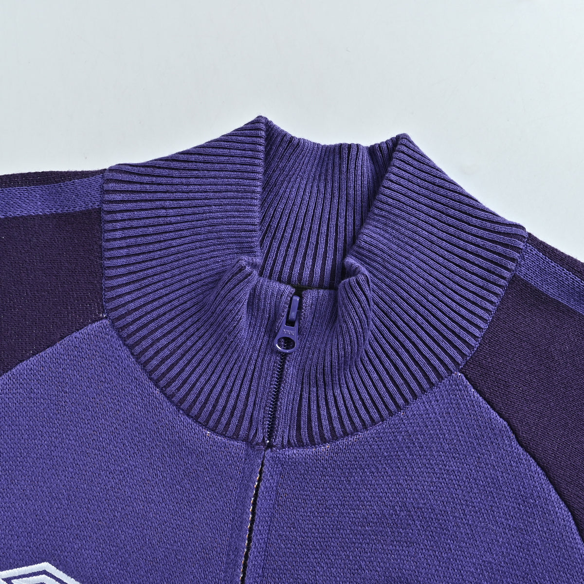 Supreme x Umbro SS25 Club-Inspired Zip Stand-Collar Knit Jacket – Purple/NavySUP-SS25-236